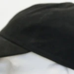 Derby Cap Oorkleppen | Zwart Leder | www.pietkoopmans.nl