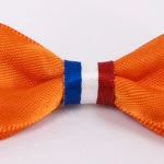 Oranje strikken met Speld | www.pietkoopmans.nl